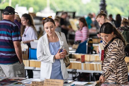 London,UK, July, 2019. Nestled under Waterloo Bridge is one of the only permanent outdoor second hand book markets in the south of Englandのeditorial素材
