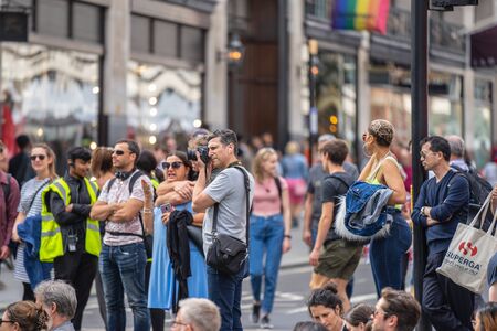 London, UK, July 14, 2019. Landscape and cityscape photographer taking pictures of free public eventのeditorial素材