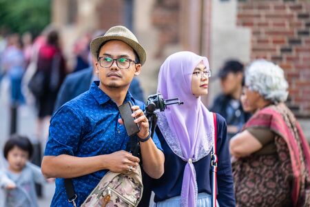 London, UK, August 1, 2019. Attractive couple going out, romantic asian couple having funのeditorial素材