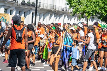 London, UK ,August 25, 2019.Caribbean colour comes to west London as Notting Hill Carnival gets into full swing with hundreds of thousands joining the throng on the capitals streetsのeditorial素材