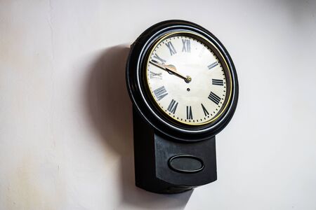 Old vintage clock on wall