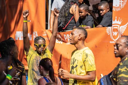 London, UK ,August 25, 2019.Caribbean colour comes to west London as Notting Hill Carnival gets into full swing with hundreds of thousands joining the throng on the capitals streetsのeditorial素材