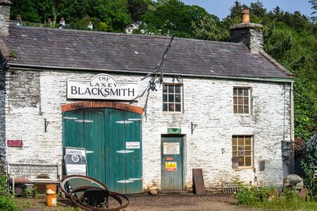 Laxey, Isle of Man, June 15, 2019. The Laxey Blacksmithのeditorial素材