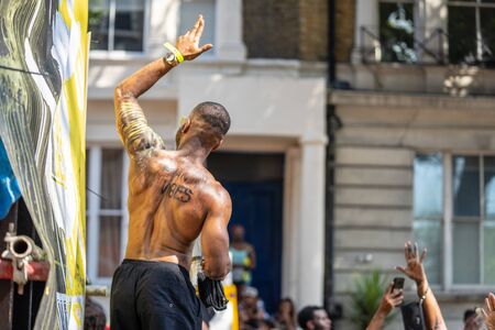 London, UK ,August 25, 2019.Caribbean colour comes to west London as Notting Hill Carnival gets into full swing with hundreds of thousands joining the throng on the capitals streetsのeditorial素材