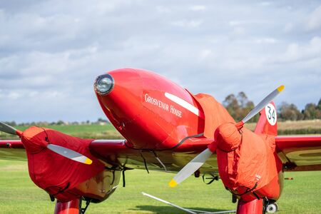 OLD WARDEN, BEDFORDSHIRE, UK ,OCTOBER 6, 2019.Small airplane ready to take off on the airfieldのeditorial素材