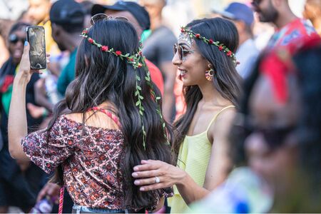 London, UK ,August 25, 2019.Caribbean colour comes to west London as Notting Hill Carnival gets into full swing with hundreds of thousands joining the throng on the capitals streetsのeditorial素材