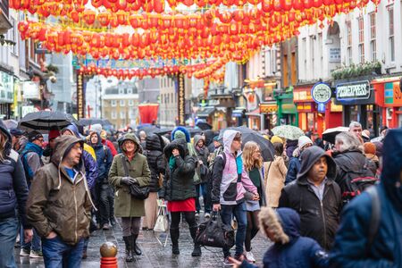 London, January 26, 2020. London Chinatown street scene on a rainy day. Busy London Streetのeditorial素材