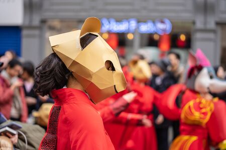 London, January 26, 2020. Members of parade in London Chinatown. Chinese New Year Celebrations. Selective focusのeditorial素材