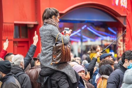 London, January 26, 2020. Members of parade in London Chinatown. Chinese New Year Celebrations. Selective focusのeditorial素材