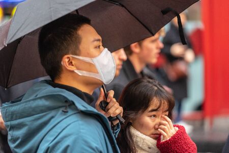 London, January 26, 2020. People wearing a face masks to protecting themself because of epidemic.Motion blur. Selective Focus. Concept of coronavirus quarantine.のeditorial素材