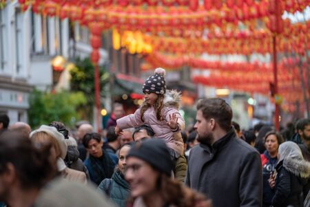 London, January 26, 2020. Members of parade in London Chinatown. Chinese New Year Celebrations. Selective focusのeditorial素材