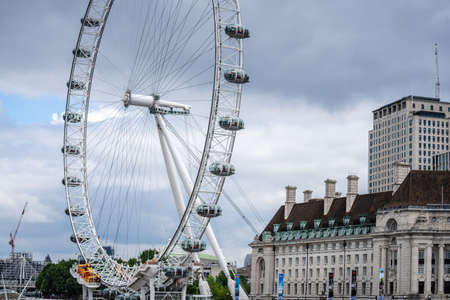 London, UK, July, 2019. The London Eye is a cantilevered observation wheel on the South Bank of the River Thames in Londonのeditorial素材