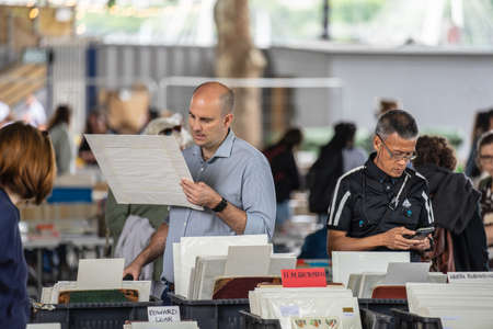 London,UK, July, 2019. Nestled under Waterloo Bridge is one of the only permanent outdoor second hand book markets in the south of Englandのeditorial素材