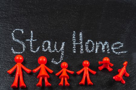 Words Stay Home on Slate Black Board. Coronavirus lockdown and stay at home conceptの写真素材