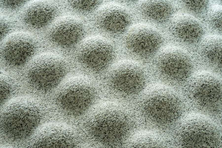 Light gray stone texture consisting of protrusions and depressions