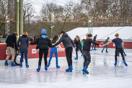 People skate on an ice rink in London in winter.UK, England, 5 January 2020のeditorial素材