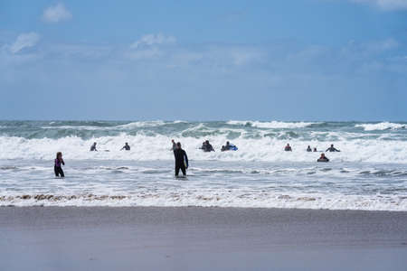Bude, Cornwall UK July 6 2020. Summerleaze beach provide some fun waves for everyone, with suitable conditions for both experienced surfers and beginnersのeditorial素材
