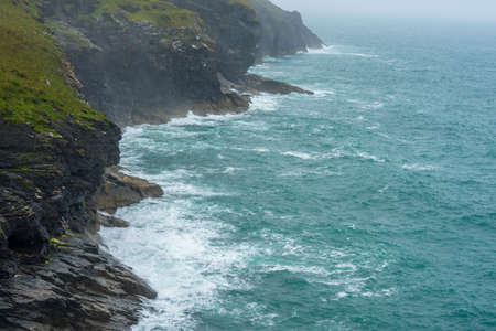 Cornwall coastline is mostly occupied by high cliffs, but also featuring islets, stacks, coves and baysの写真素材