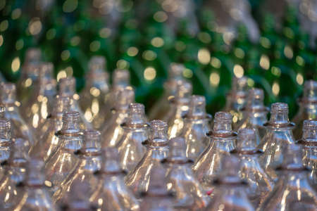 A lot of glass empty bottles, selective focus close up viewの写真素材