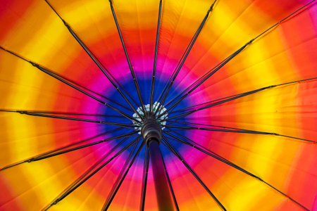 Rainbow colorful ubrella inside, background wallpaperの写真素材