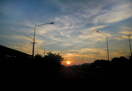 Sunrise mornig on silhouette traffic roadの写真素材