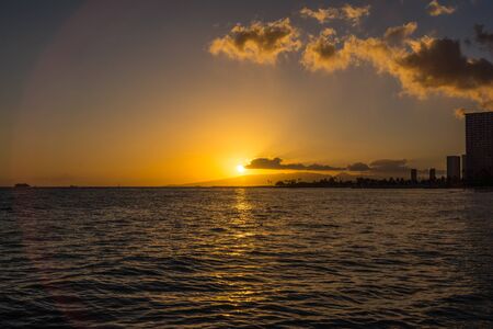 Sunset in Waikiki, Oahu, Hawaiiの写真素材