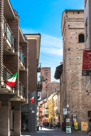View of Sineo Tower from Cavour street in old city of Alba, Italyのeditorial素材