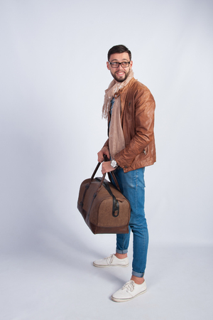 Man with travel bagの写真素材