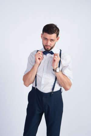 Studio photo of man with a bow tieの写真素材