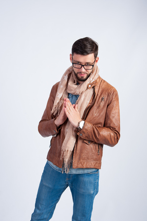 Young man in a brown jacketの写真素材