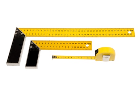 photos of the construction meter isolated on white backgroundの写真素材