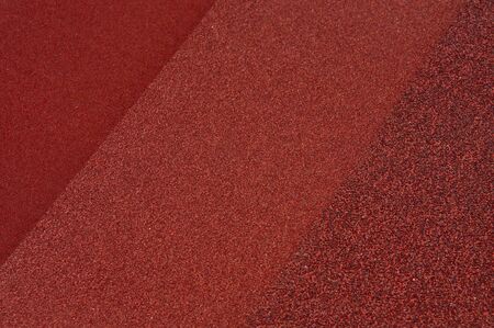 three sandpaper sorted as abstract background