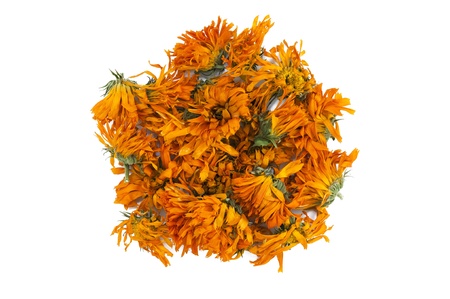 dried marigold flowers for tea on a white backgroundの写真素材
