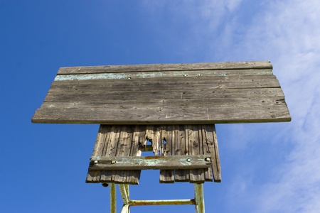 Board on a blue sky backgroundの写真素材