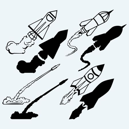 Rocket icon. Isolated on blue background. Vector silhouettesのイラスト素材