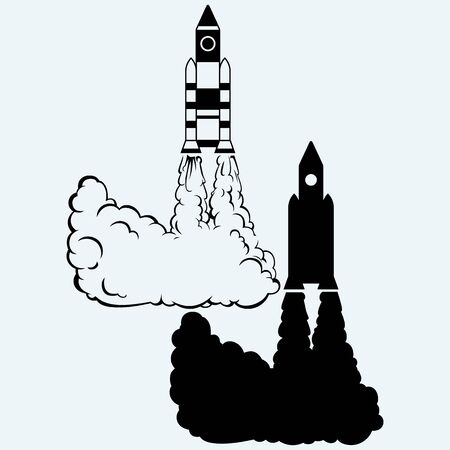 Rocket icon. Isolated on blue background. Vector silhouettesのイラスト素材