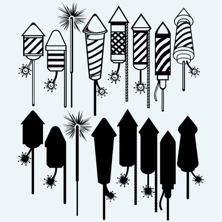 Rocket fireworks. Isolated on blue background. Vector silhouettesのイラスト素材