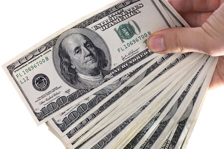 Dollars are in womanish hands. Isolated.
