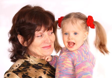 Portrait of grandmother and granddaughter. White background.