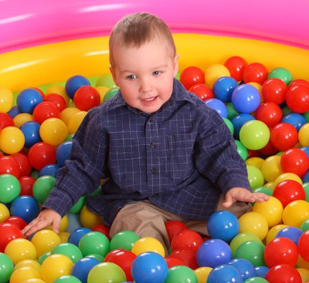 Birthday of fun boy in color balls.の写真素材