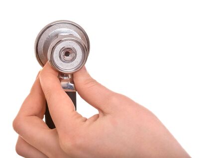 Stethoscope and hand. Medicine equipment. Isolated.の写真素材