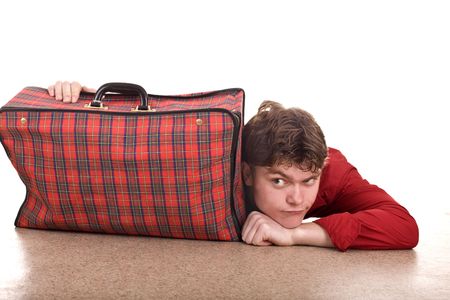Happy man with travel suitcase . Isolated.の写真素材