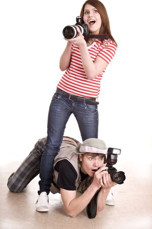 Photographer couple with digital camera. Isolated.の写真素材