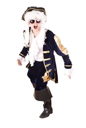Man in sunglasses and old costume with wig. Isolated.の写真素材