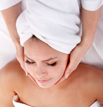  Beautiful young woman in spa. Facial massage.の写真素材