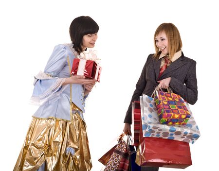 Two beautiful girlfriends enjoy shopping. Isolated.の写真素材