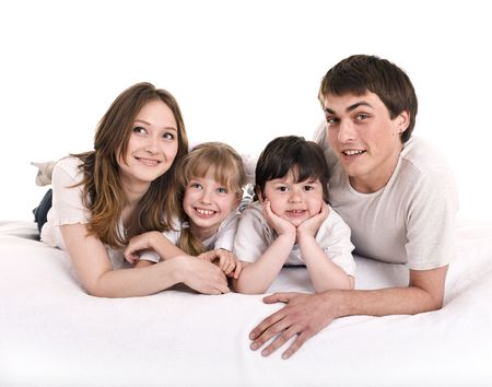 Happy family: mother, father, daughter, son. Isolated.の写真素材