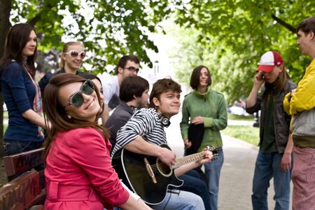  Group of people on city in park. Music.の写真素材