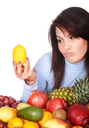 Girl with group of fruit and vegetables. Isolated.の写真素材