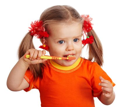  Child girl clean brush teeth. Isolated.の写真素材